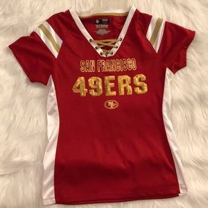 Cute 49er top with gold embellishments. Top shape